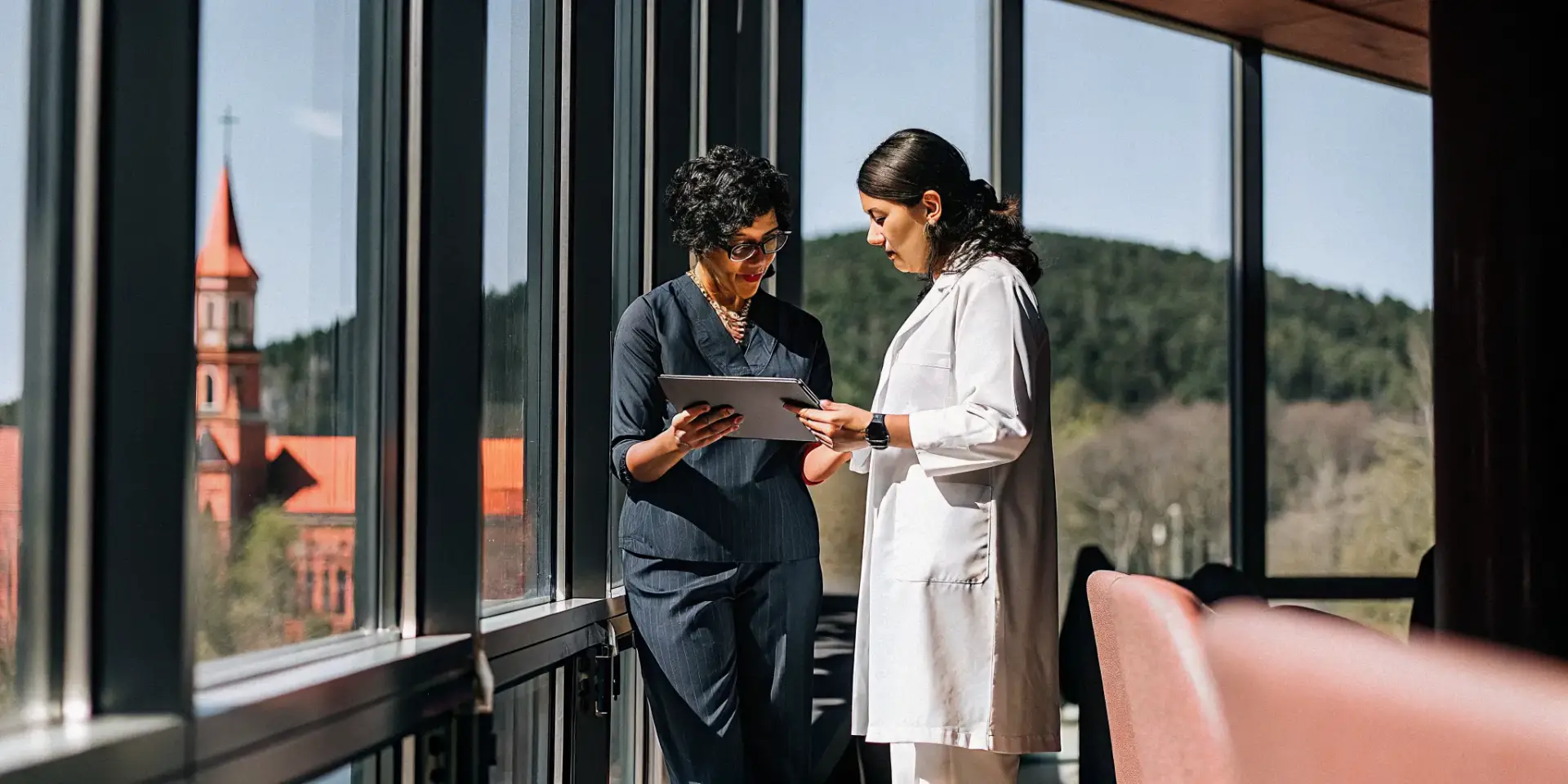 Woman consulting with an expert at a medical spa in Fayetteville, AR.
