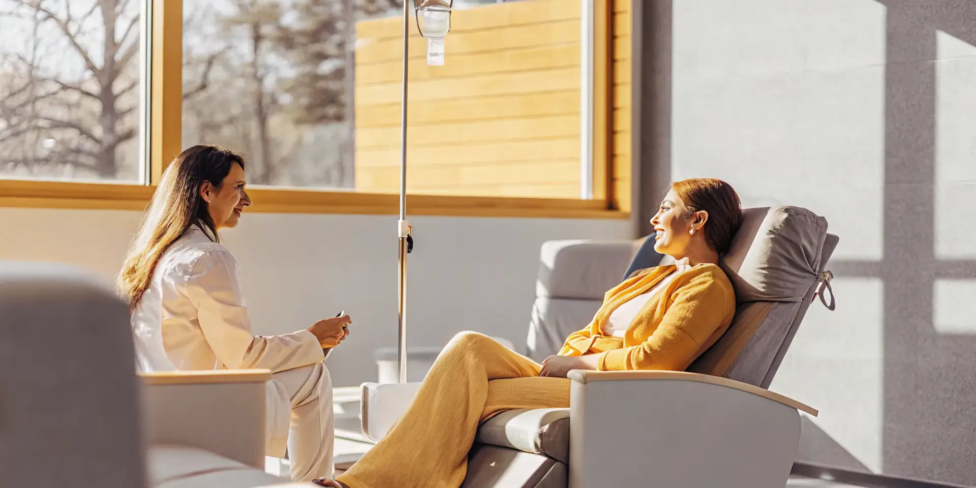 Patient discussing IV therapy with a medical provider in Fayetteville