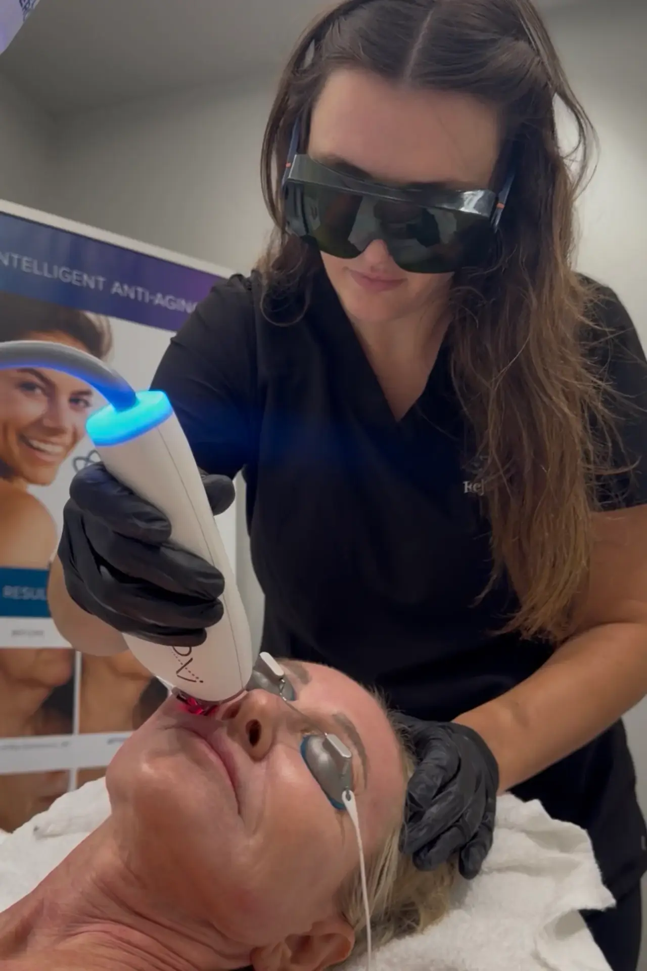 MOXI laser treatment session at Rejuvenated Med Spa, Fayetteville, AR